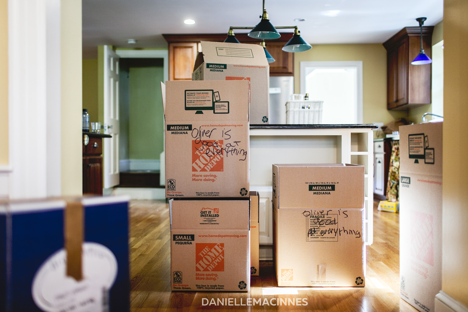 moving boxes stacked in kitchen