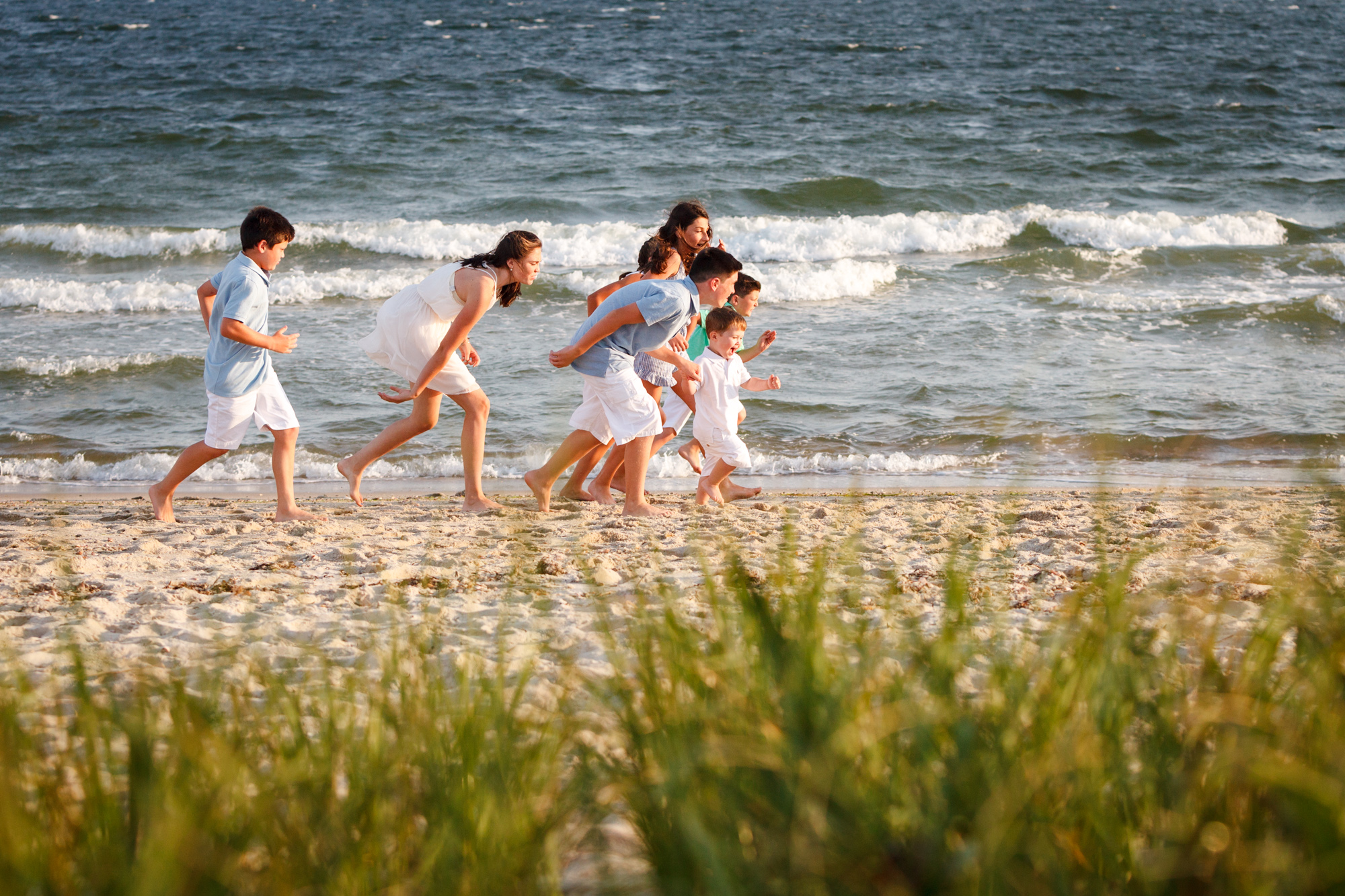kids running on beach at photoshoot